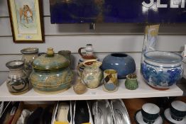 A selection of studio pottery items including a jug having a St Meots stamp, a pot with G stamps