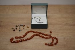 A silver and amethyst Kit Heath Heritage necklace and drop earring set in a Mackintosh style, sold