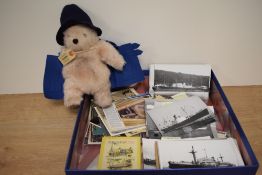 A Gabrielle Designs Ltd Paddington Bear soft toy and a selection of assorted vintage postcards