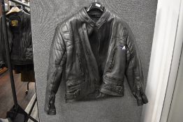 A mens AKITO padded leather motorbike jacket size 44.