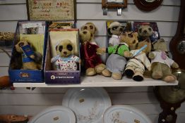 Twelve comparethemarket soft toy meerkats including Aleksandr, Oleg and Sergei.