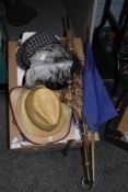 Am assortment of vintage items including ladies feathered hats, gents ska and straw hats, a cream