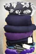 A selection of large pieces of wool in purple, dark navy and black, also included are an