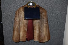 A ladies boxy fur jacket having inner label Victor Segall Ltd. The Expert London Furriers 36'