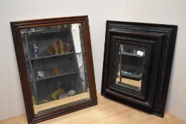 A 19th/20th Century Dutch ebonised wall mirror, of 17th Century style, with stepped and moulded