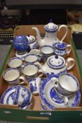 Approximately thirty pieces blue and white Ringtons china in 'Willow' pattern produced by Wade