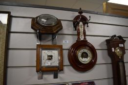 Trio of barometers to include one art deco barometer and others.