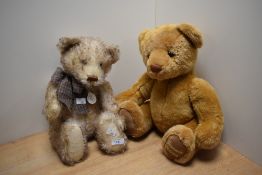 A 20th Century Gund teddy bear, having tipped mohair and jointed body, measuring a seated height