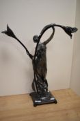 An Art Nouveau style lamp base, with double stemmed flower lamp holders, with classically styled