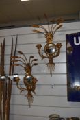 A pair of italian style gilded Wheat sheaf mirrored sconces.