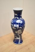 A 19th Century Chinese blue and white Prunus vase, of baluster form with character marks to the