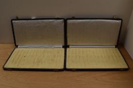 Two fifteen pen display cases in blue.