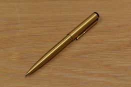 A Parker gold coloured ballpoint pen.