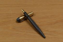 A Whal Eversharp lever fill fountain pen in grey having plated cap and Eversharp 14K nib. Cap fits