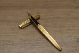 A boxed Waterman CF aerometric fill fountain pen in gold having 18K 750 nib.