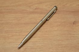 A boxed Quartz ballpoint digital watch pen in steel.