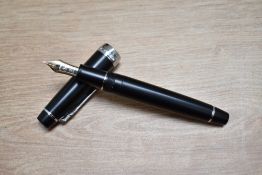 A boxed Sailor Pro Gear II Imperial converter fill fountain pen in matt black having a Duotone
