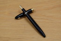 A Sheaffer Saratoga snorkel fill fountain pen in black having a Sheaffer 14K Made in USA nib.
