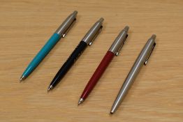 Four Parker Jotter ballpoint pens teal, red, brushed steel, black (black advertising SAGA