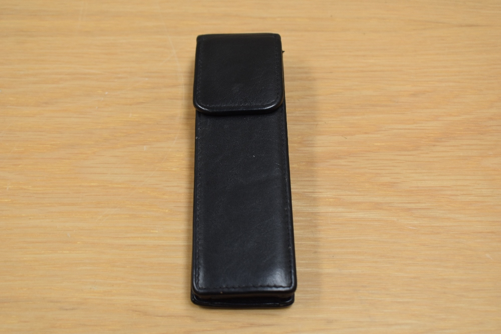 An unnamed two pen leather pen case.