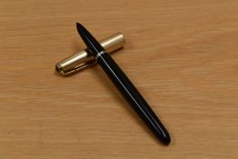 A Parker 51 aerimetric fill fountain pen in black with rolled gold reeded cap.