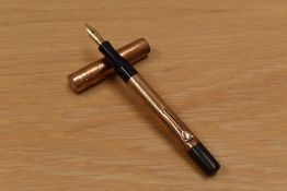 A Mabie Todd & Co. Swan lever fill safety pen with hallmarked gold overlay having a Swan 2 14K