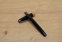 A Sheaffer Imperial IV cartridge fill fountain pen in black with gold trim having Sheaffer 14K 585
