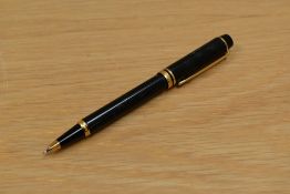 A boxed Waterman Le Man 100 propelling pencil in black with gold trim.