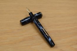 A Waterman Ideal lever fill fountain pen in blue marble having Waterman 14ct England 2A nib.