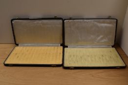 Two fifteen pen display cases in blue.