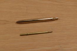 A boxed Waterman Flai petite ballpoint pen in yellow metal with pouch and original boxed refill.