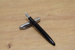 A Sheaffer Craftsman touchdown fill fountain pen in black with chrome cap having a Sheaffer M1