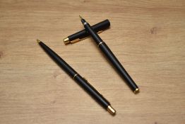 A boxed Parker Classic aero fill fountain pen and ballpoint pen set in matt black with gold trim