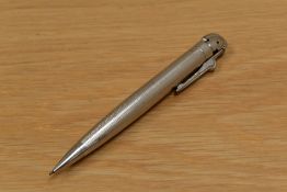 A boxed Ronson Lighter/propelling pencil in rhodium plate.