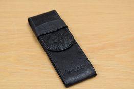 A Sheaffer two pen leather pouch.