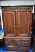 An 18th Oak linen press/wedding chest , with interior fittings on drawer base, dimensions approx