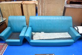 A vintage vinyl settee and chair, in teal, sold as upholstery project/collectors item