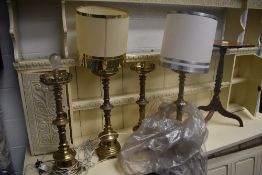 A set of four ecclesiastical style electric lamp bases