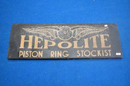 A metal advertising sign 'Hepolite Piston Ring Stockists' (not enamel), size approx 92 x 32cm