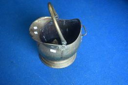 A traditional brass copal helmet