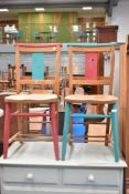 A pair of traditional chapel chairs, later painted