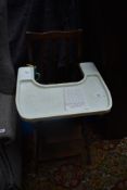 A vintage childs high chair (sold as decorative collectable only)