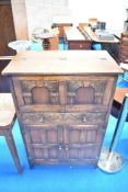 A Priory style cocktail cabinet in oak