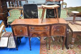 A reproduction Regency sideboard and bergere stool