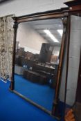 A Victorian Aesthetic style mirror, having inlaid burr walnut detail and ebonised finish, approx