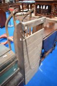 Two vintage wooden toboggans.