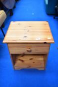 A small modern beside drawer cabinet