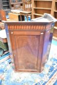 A 19th Century mahogany cupboard having line inlay decoration