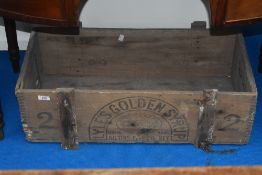 A vintage Lyles syrup crate