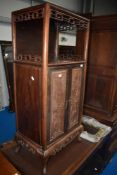 An Oriental hardwood side cabinet , height approx. 119cm
